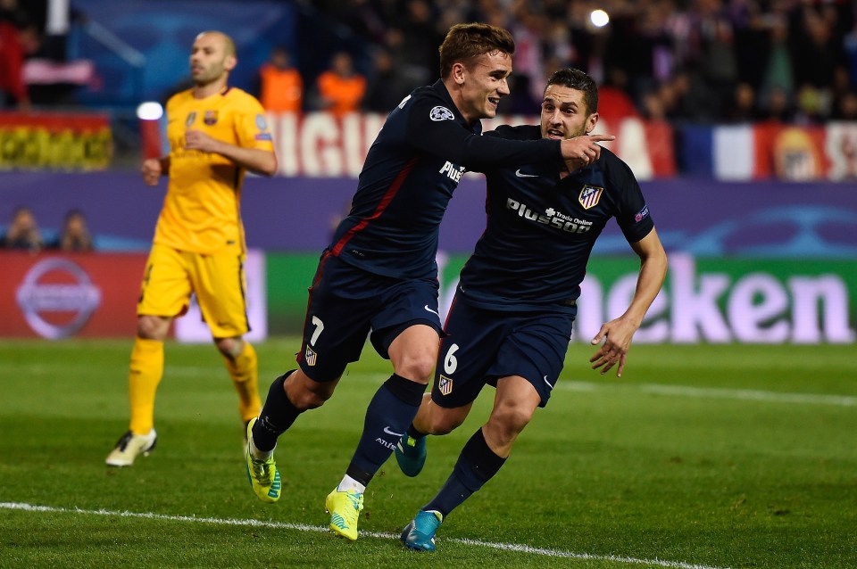  Antoine Griezmann celebrates after netting brace against Barcelona