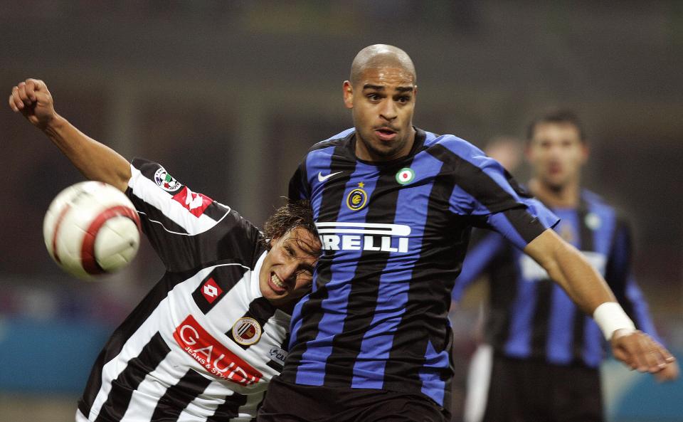 MILAN, Italy: Inter Milan's forward Adriano of Brazil (R) fights for the ball with Ascoli's defender Gianluca Comotto during their italian serie A football match at San Siro stadium in Milan, 03 December 2005. AFP PHOTO / PACO SERINELLI (Photo credit should read PACO SERINELLI/AFP/Getty Images)