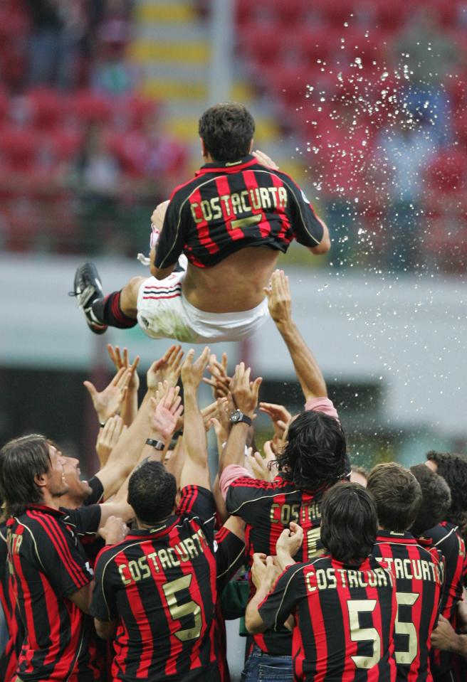  AC Milan players hoist Alessandro Costacurta in the air after final Milan game