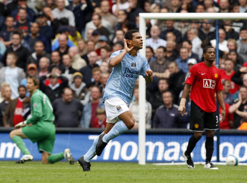  Geovanni celebrates after scoring only goal of derby at City of Manchester Stadium