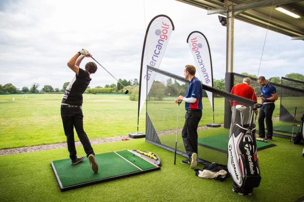 Sun man Dean Scoggins sees how much his swing is improved with some extra help