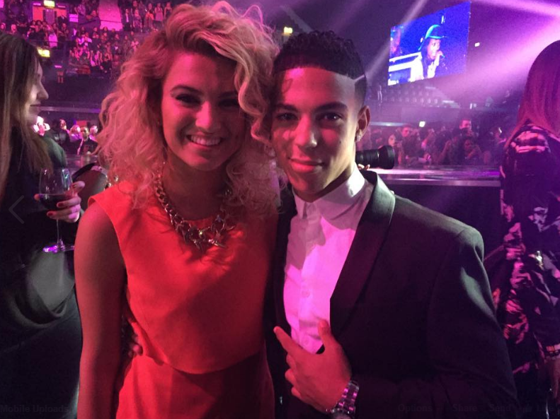  The singer, pictured here with US star Tori Kelly, had members of Beyonce's team behind him