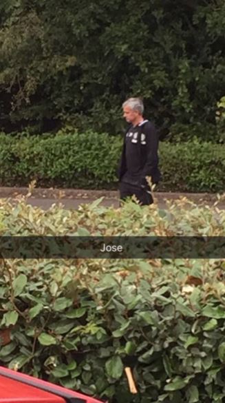  Jose Mourinho stands in the car park watching his charges