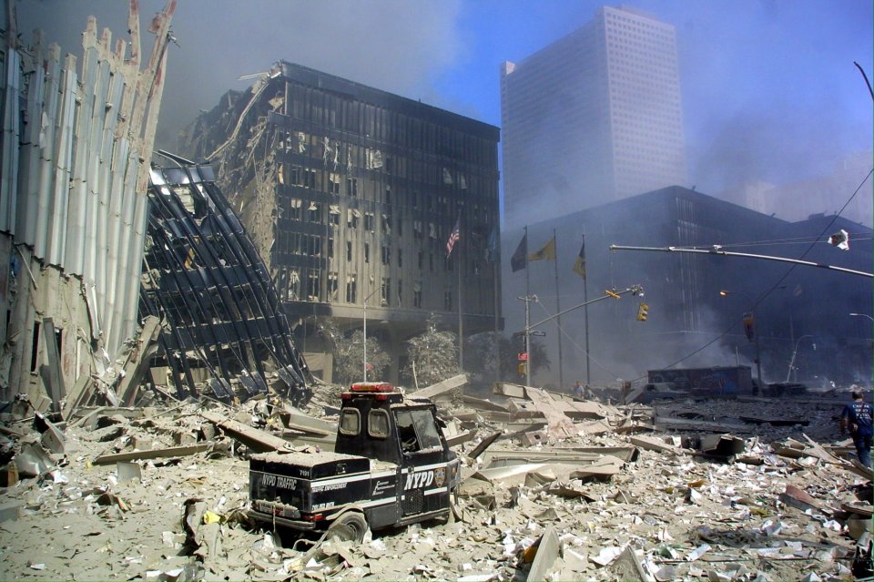 A police scooter sits in the rubble in lower Manhattan