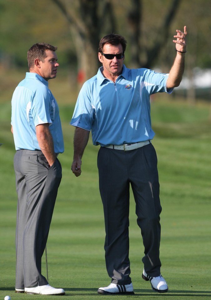  Europe's then-Ryder Cup Captain Nick Faldo (right) talks with Lee Westwood in 2008