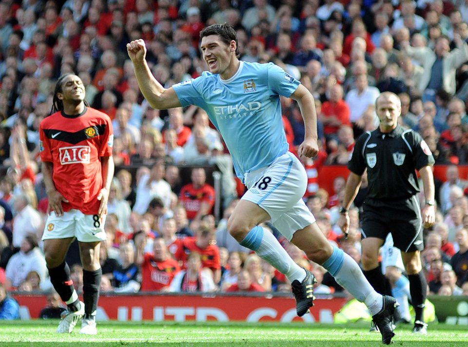  Gareth Barry celebrates after equalising for Manchester City at Old Trafford