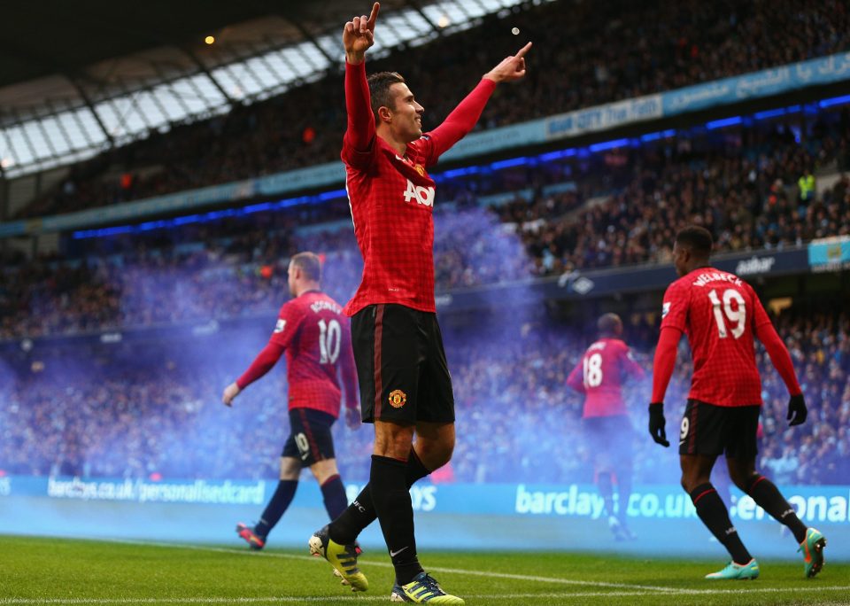  Robin van Persie celebrates after scoring late winner in first Manchester derby