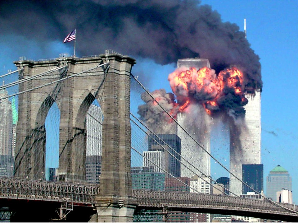 The second tower of the World Trade Center bursts into flames after being hit by a hijacked airplane