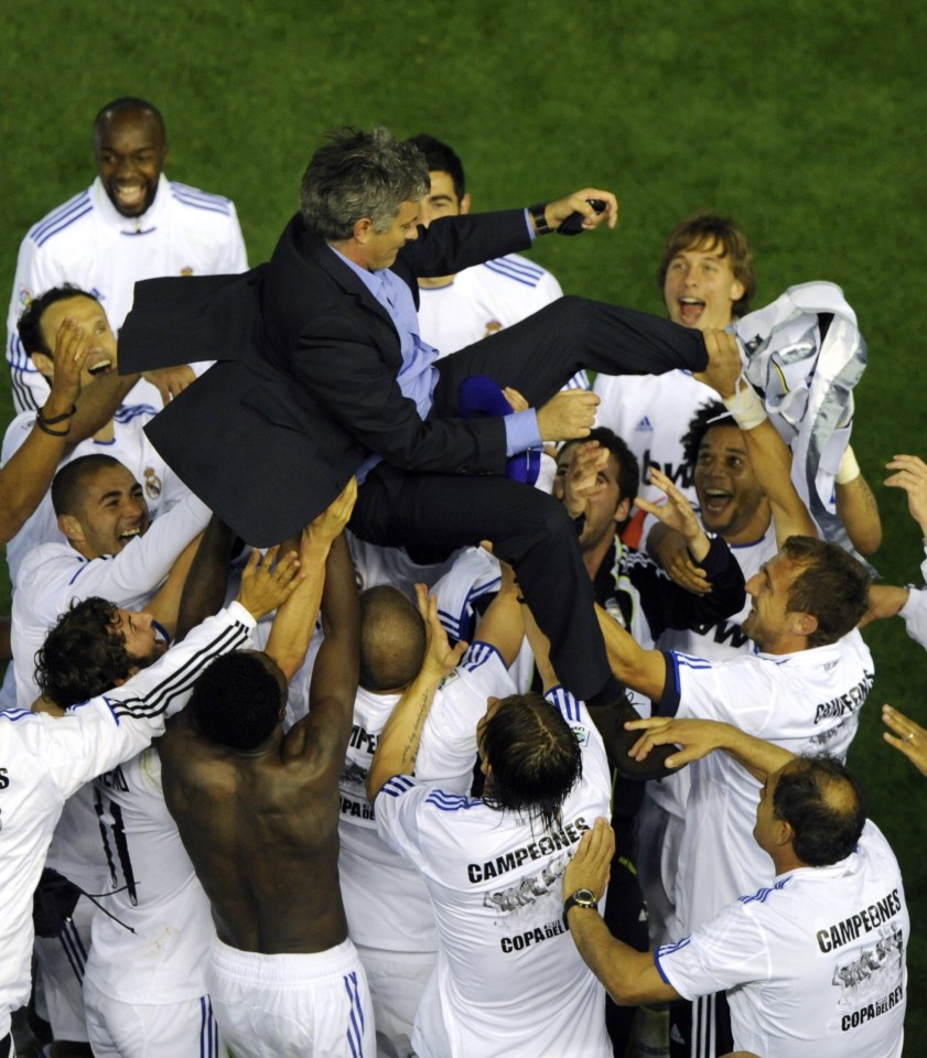 Jose Mourinho is hoisted aloft after winning the Copa del Rey with Real Madrid