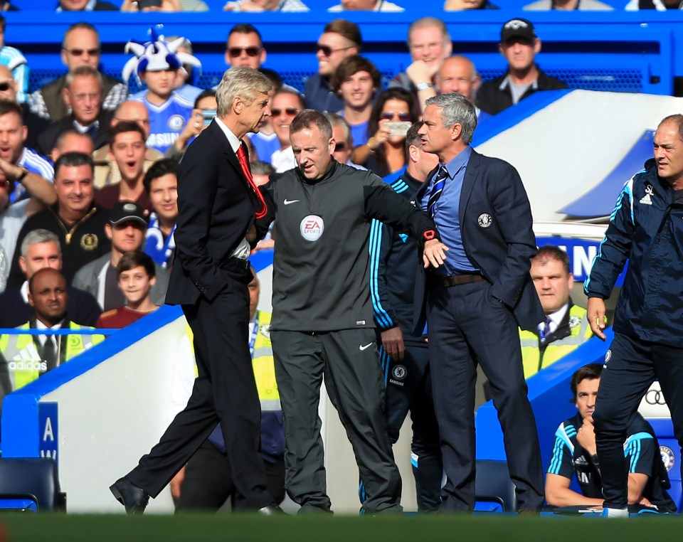  The feuding pair had to be held apart during their touchline bust-up