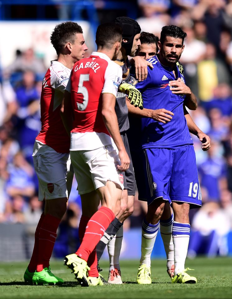  Diego Costa clashes with Gabriel as the latter is sent off for Arsenal