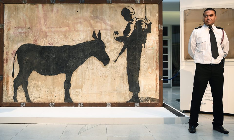  Banksy's works have fetched as much as £500,000 at auction as he became a global art sensation