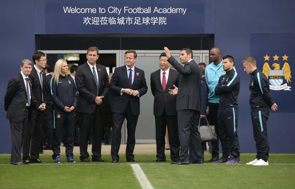  David Cameron and China's President Xi Jinping were shown around Manchester Citys City Football Academy