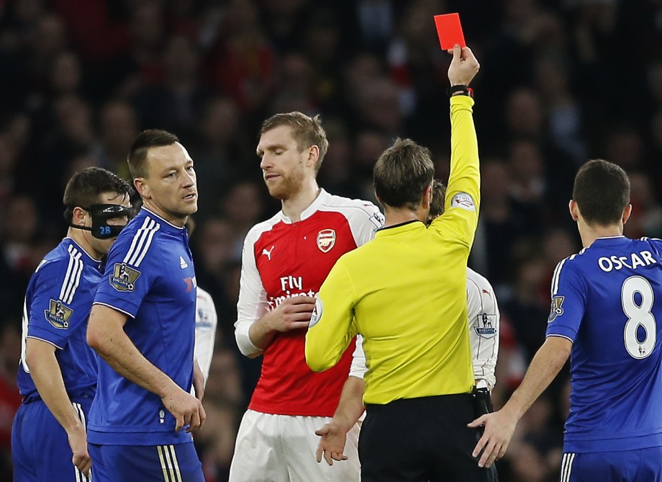  Per Mertesacker is shown a red card for his foul on Diego Costa in January