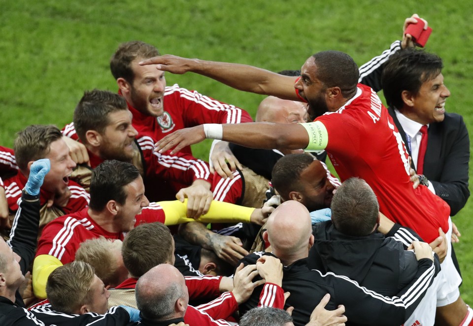  Ashley Williams celebrates with his Wales teammates and bench after scoring the equalising goal against Belgium at Euro 2016