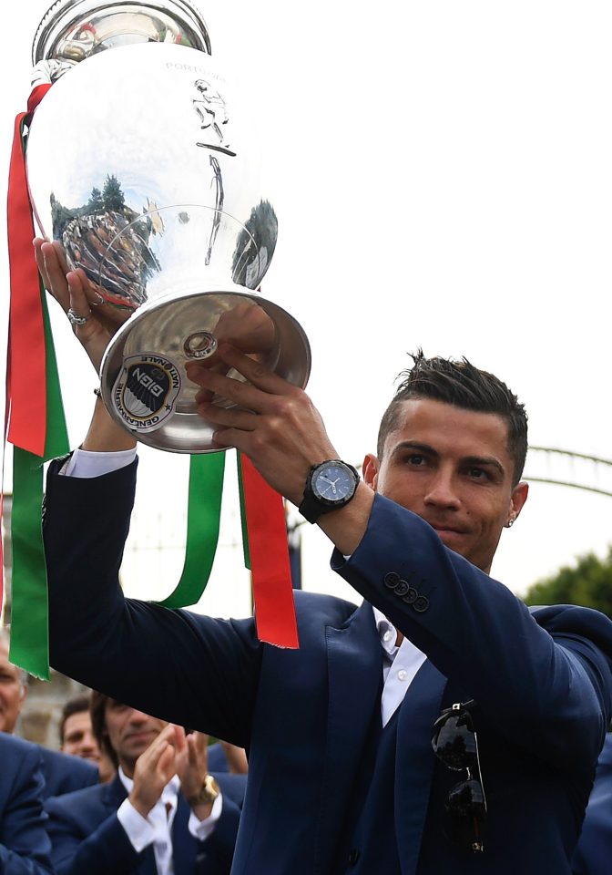  One trophy Argentina's Messi won't get his hands on...a triumphant Ronaldo lifts the Euro 2016 cup won with Portugal this summer