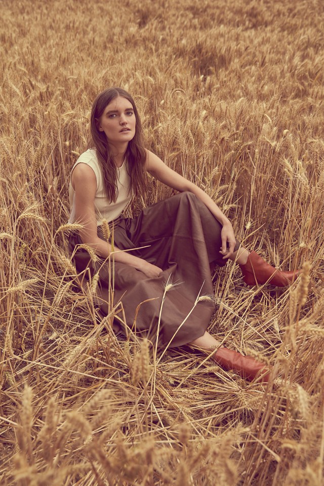  Brown leather skirt, M&S, £199; cream top, £65, Topshop; leather boots, £79.99, Zara