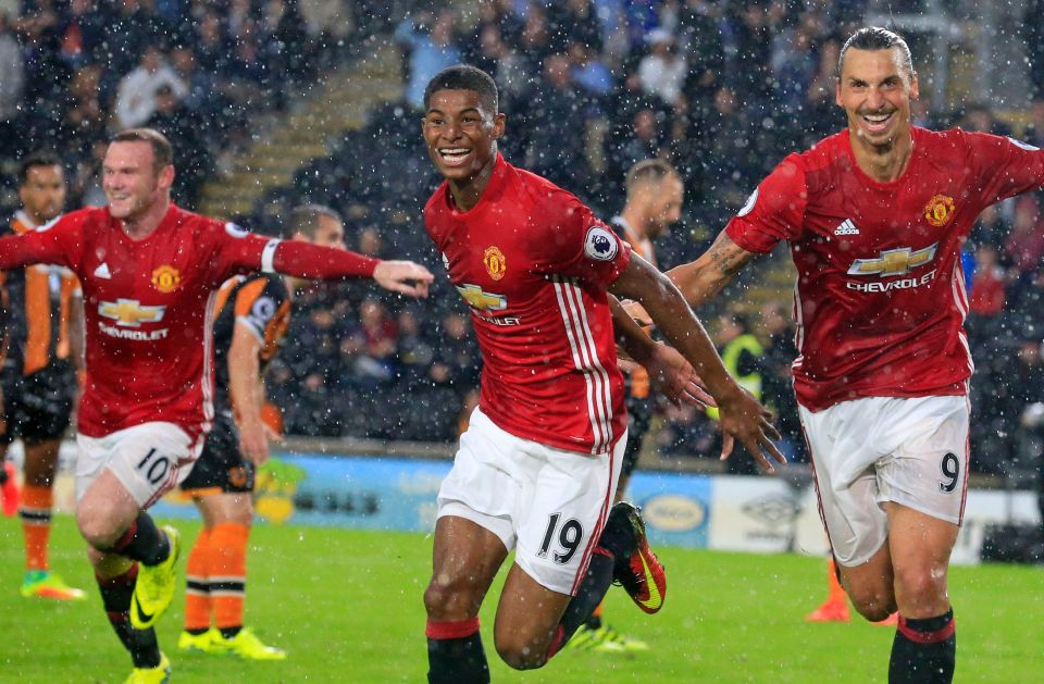  Marcus Rashford is chased by Wayne Rooney and Zlatan Ibrahimovic after scoring