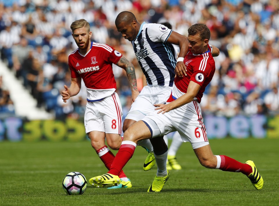  Ben Gibson makes a last ditch challenge on West Brom striker Salomon Rondon