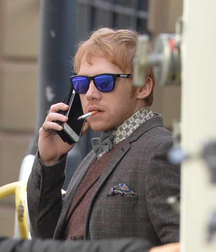  Rupert Grint proved he's truly all grown up, as he was caught smoking on set of Snatch, which he is producing and acting in