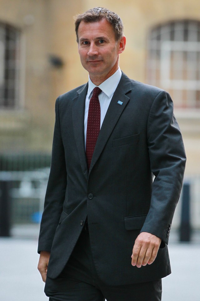 Jeremy Hunt looking cheerful as he arrives at the BBC studios but quickly put his serious political face on as Junior Doctors going on strike again - London