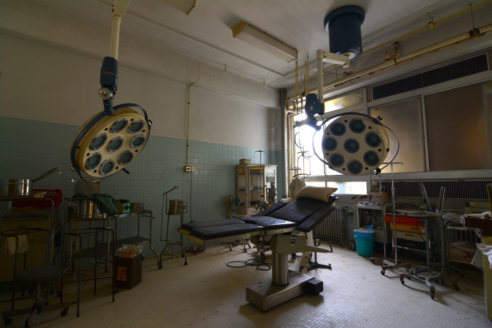  Chilling empty operating theatre in an abandoned hospital