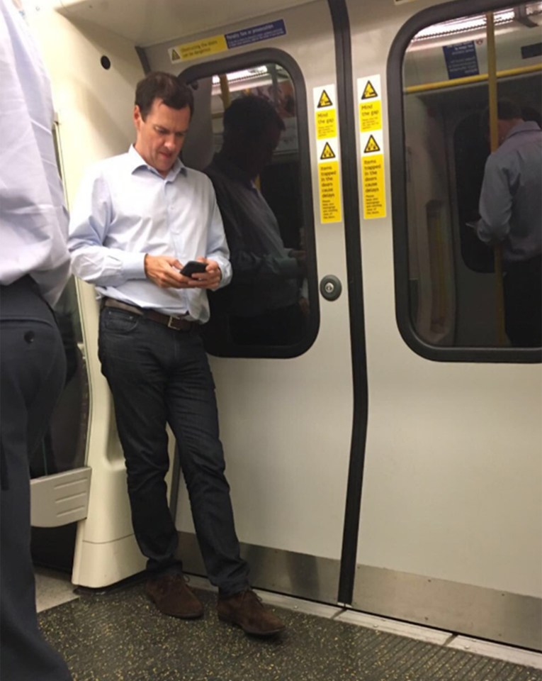  George Osborne pictured looking lonely on the London Underground