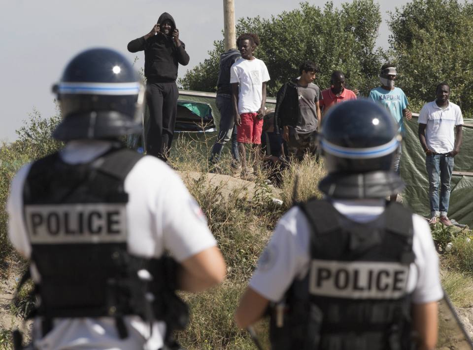  Migrants lit fires and blockaded the road as they tried to ambush motorists heading for the ferry terminal