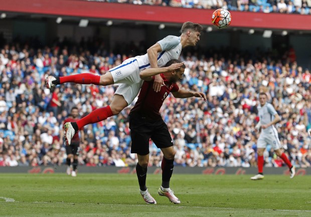 John Stones claims he casn mix it up at international level