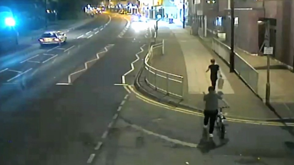  Footage released by Manchester police shows a man following a woman shortly before an attempted kidnap