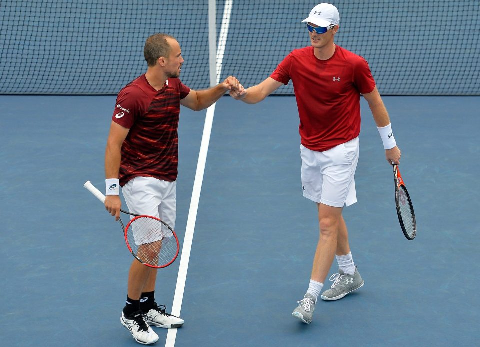 Murray and his Brazilian partner Soares celebrate during their third-round victory