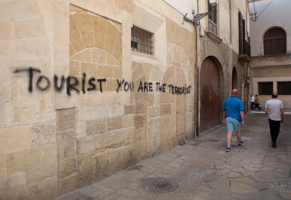  This graffiti claims tourists are the terrorists