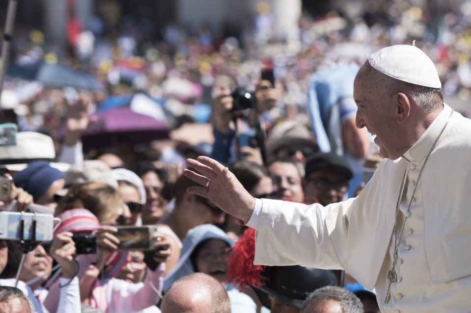  Pope Francis is driven through the crowd after celebrating a Canonisation Mass for Mother Teresa