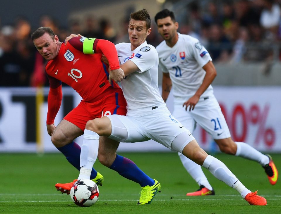 Wayne Rooney was bogged down in midfield in the opening half against Slovakia