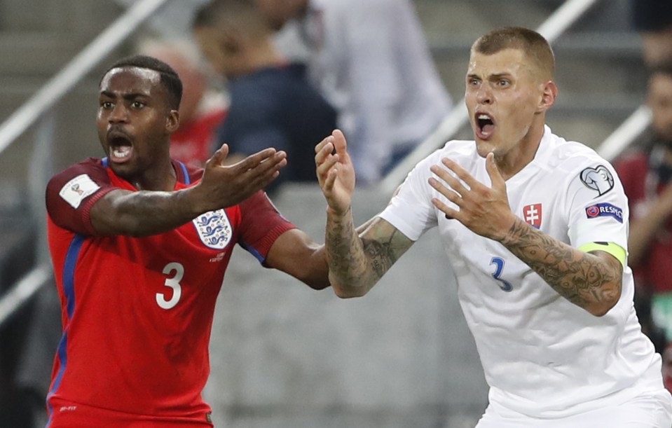  Skrtel looks on in agony as he is sent-off for his stamp on Harry Kane