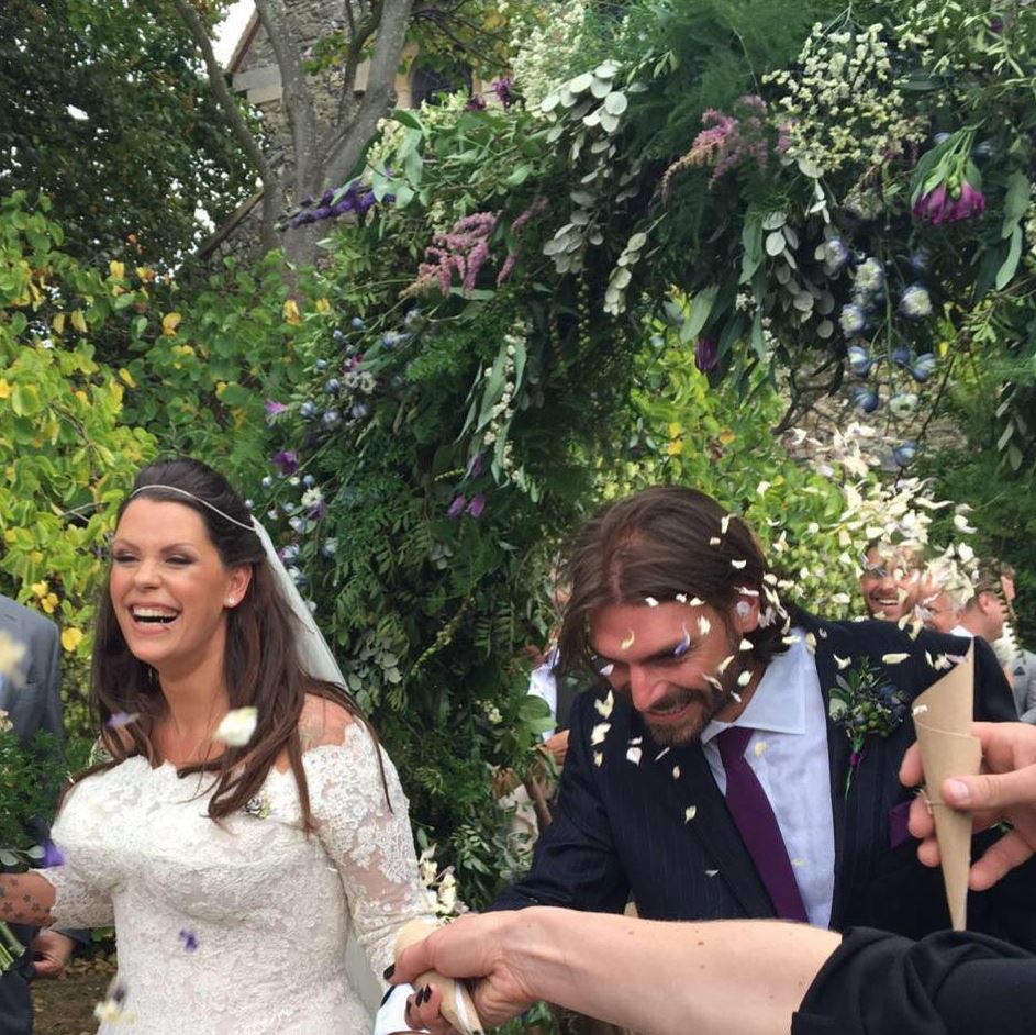 Fifi Geldof beamed with delight as she emerged from her wedding ceremony on Saturday