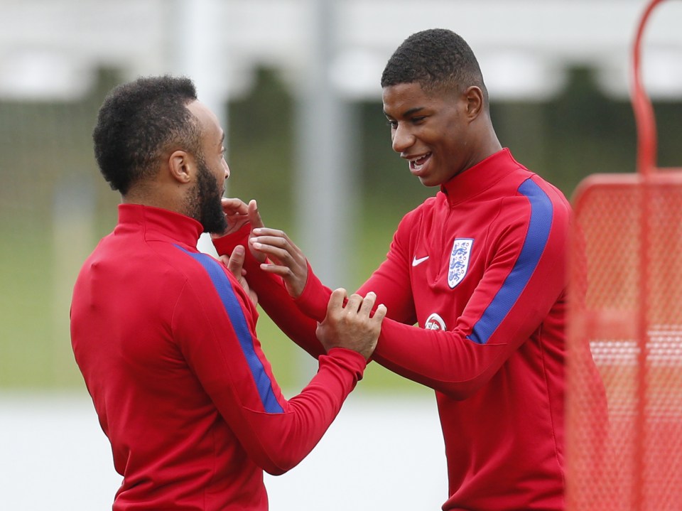  Marcus Rashford shares a joke with his England U21s team-mate Nathan Redmond