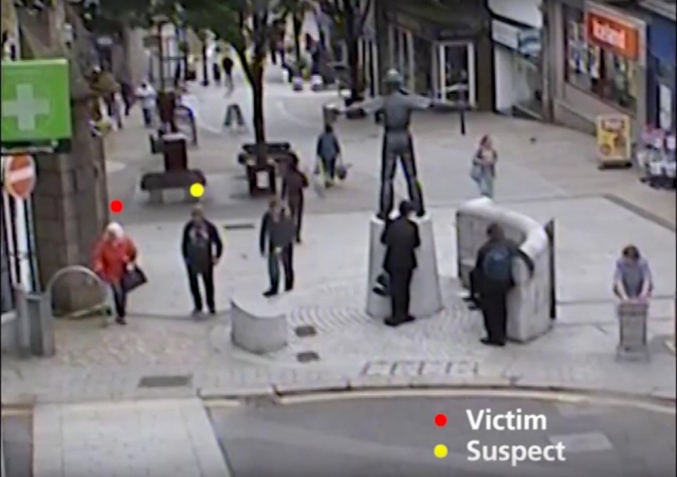  CCTV shows the thief following the elderly lady through a busy shopping street in Redruth, Cornwall