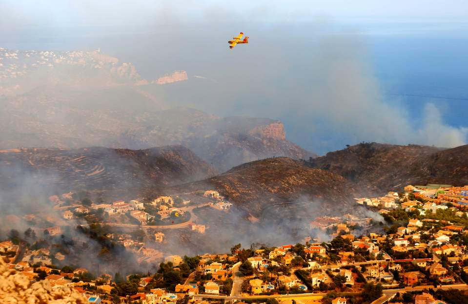  The fires decimated parts of the holiday area, destroying residents' homes and tourist villas