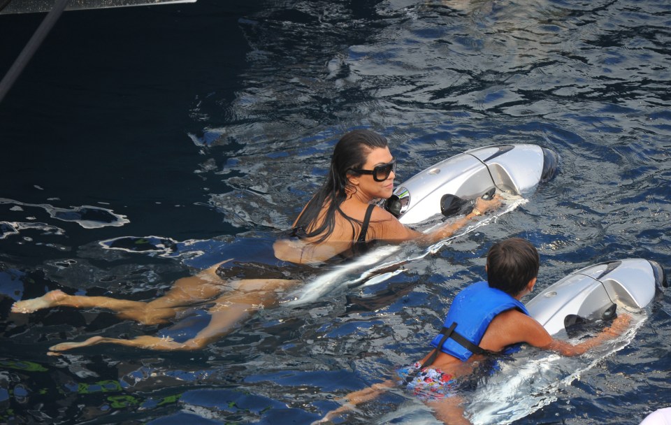  Kourtney joined six-year-old Mason on a mini jet ski