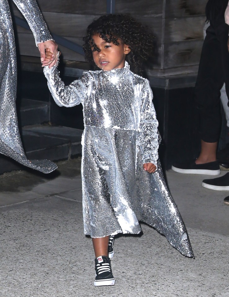  North held on to her mother's hand tightly as they made their way to their car