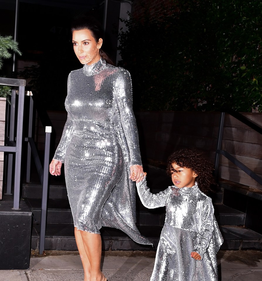  The metallic dresses were a magnet for reflecting the paparazzi flashbulbs