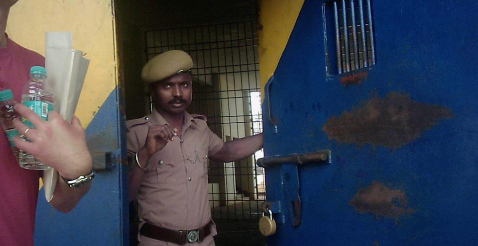  A guard at the gate to Chennai Central Prison where the six war heroes are held