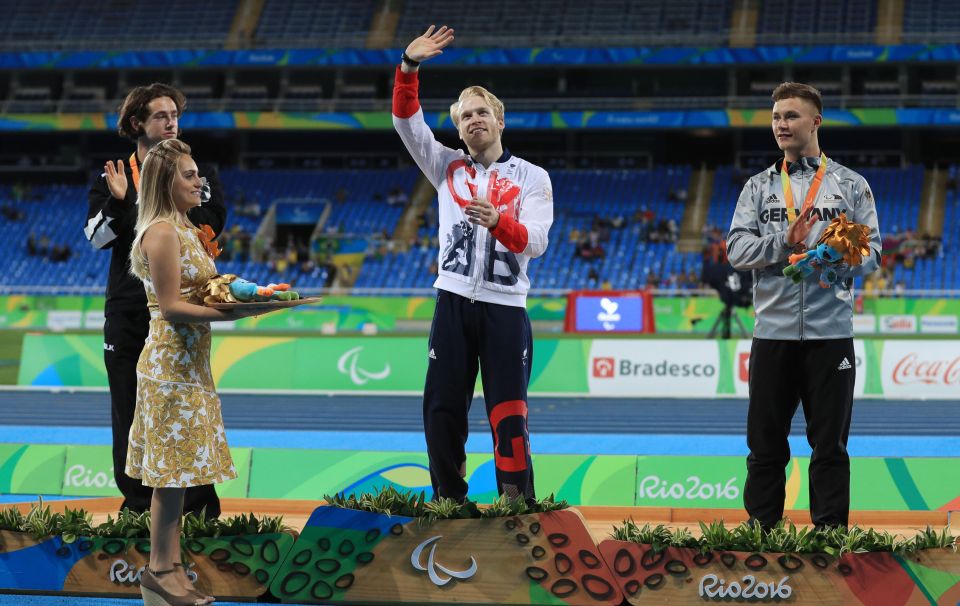  Jonnie Peacock celebrates his T44 100m gold in front of a deserted stand