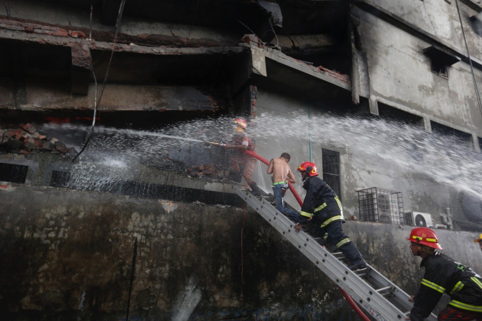  Firefighters desperately battled the flames as they tried to rescue the unknown people who could still be trapped inside