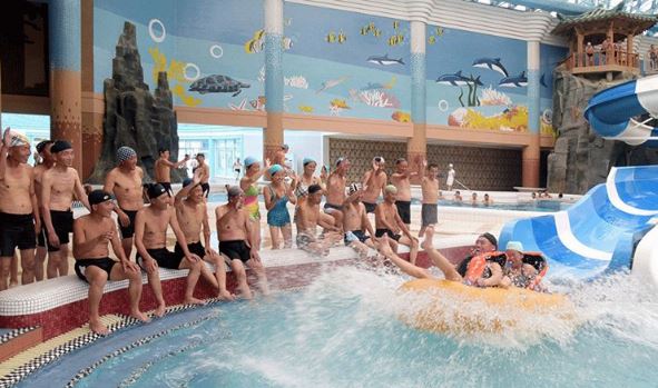 The event observed participants enjoying a waterslide