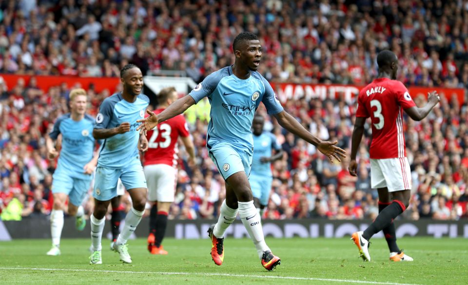  Young striker - in for banned Sergio Aguero - celebrates