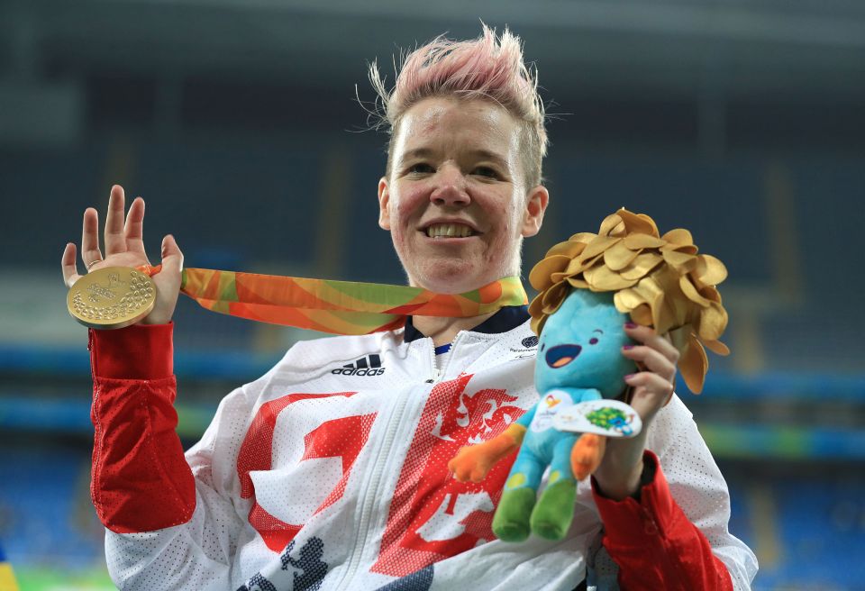  Joanna Butterfield celebrates with her gold for the Women's Club Throw in the F51 Final