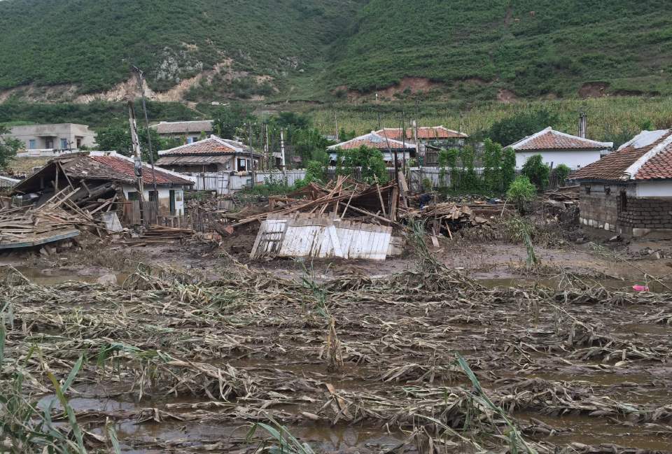  Rescue workers have struggled to reach North Korea's flood-ravaged communities