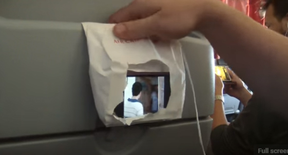  This phone holder can be made from a airline sick bag